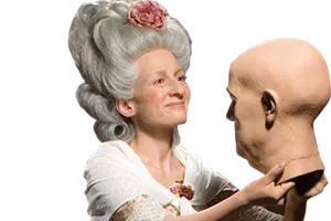 madame tussaud holding wax head