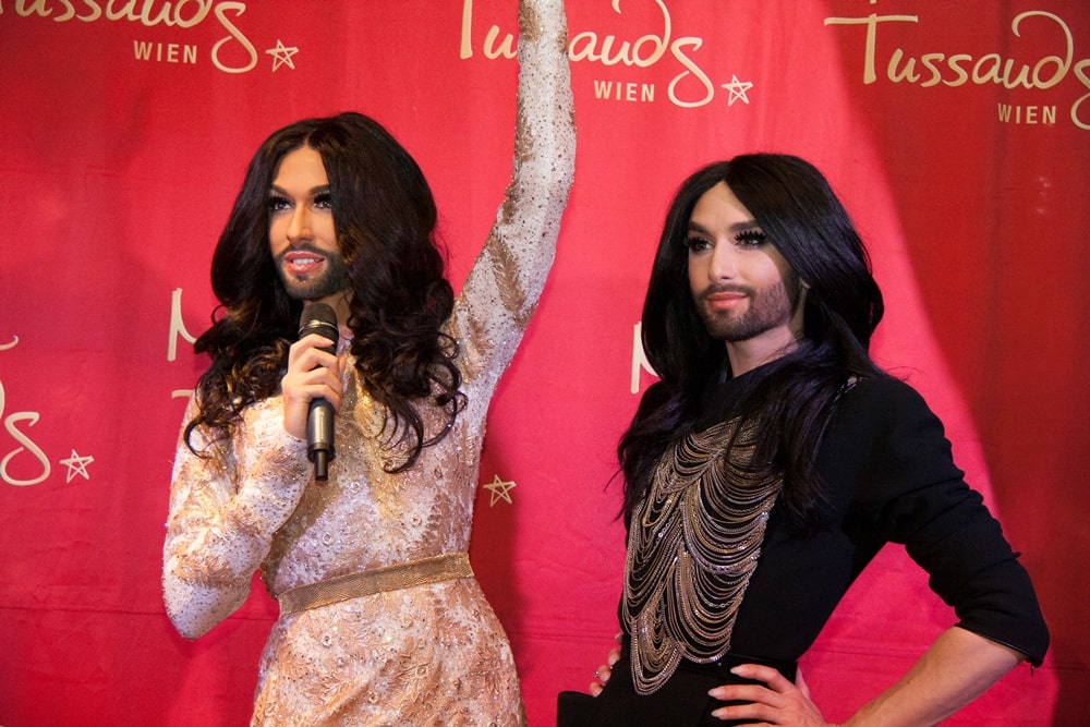 Conchita Wurst poses with her figure at Madame Tussauds™ Vienna