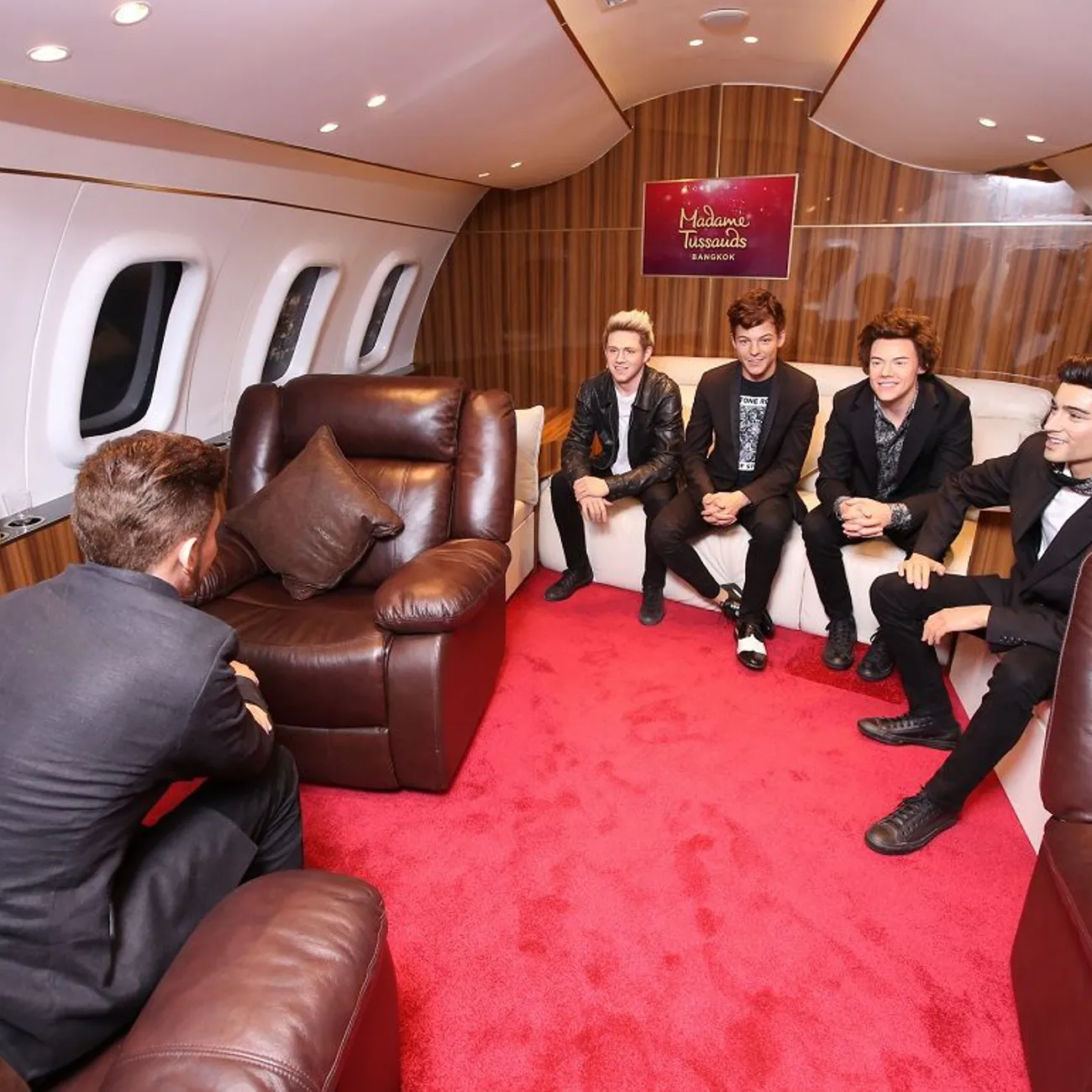 An old pencil drawing of Don Quixote and Sancho Panza sitting on their horses, by Wilhelm Marstrand.