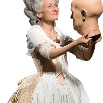 Marie Tussauds mit dem Kopf einer Wachsfigur