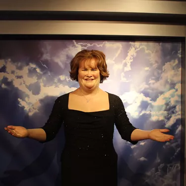 Susan Boyle's wax figure with her arms out at Madame Tussauds Blackpool