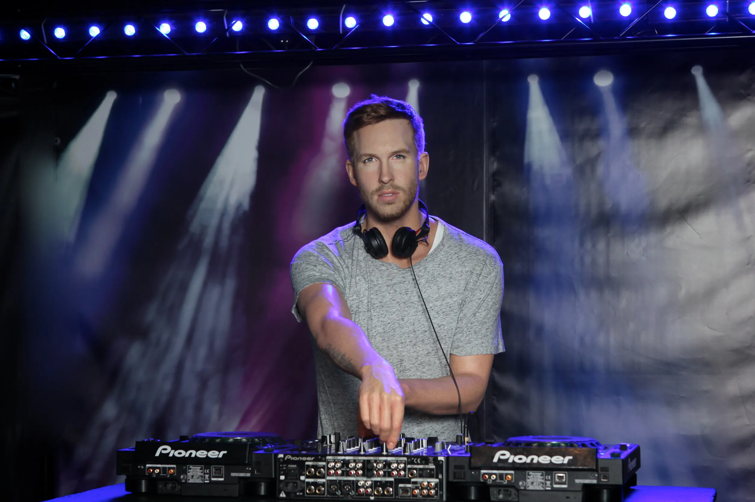 Calvin Harris DJ's on a deck at Madame Tussauds Blackpool