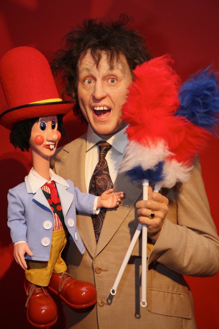 Ken Dodd with his feather duster wax figure at Madame Tussauds Blackpool