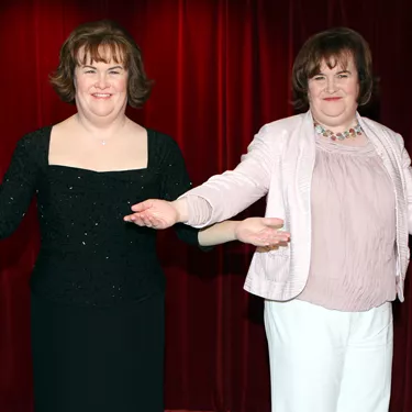Susan Boyle stands next to her wax figure at Madame Tussauds Blackpool