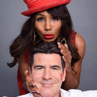 Sinitta holds Simon Cowell's head for the launch reveal at Madame Tussauds Blackpool
