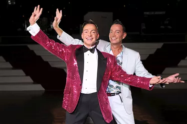 Craig Revel strikes the same dance pose alongside his wax figure at Madame Tussauds Blackpool
