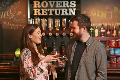 Guests enjoying a drink at the Rovers Return bar in Madame Tussauds Blackpool