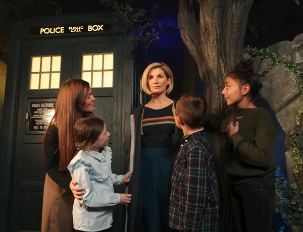 Guests visiting the Dr. Who wax figure at Madame Tussauds Blakcpool
