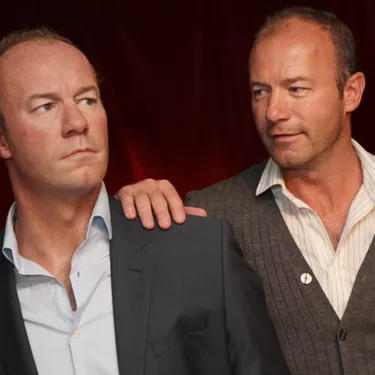 Alan Shearer staring at his wax figure at Madame Tussauds Blackpool