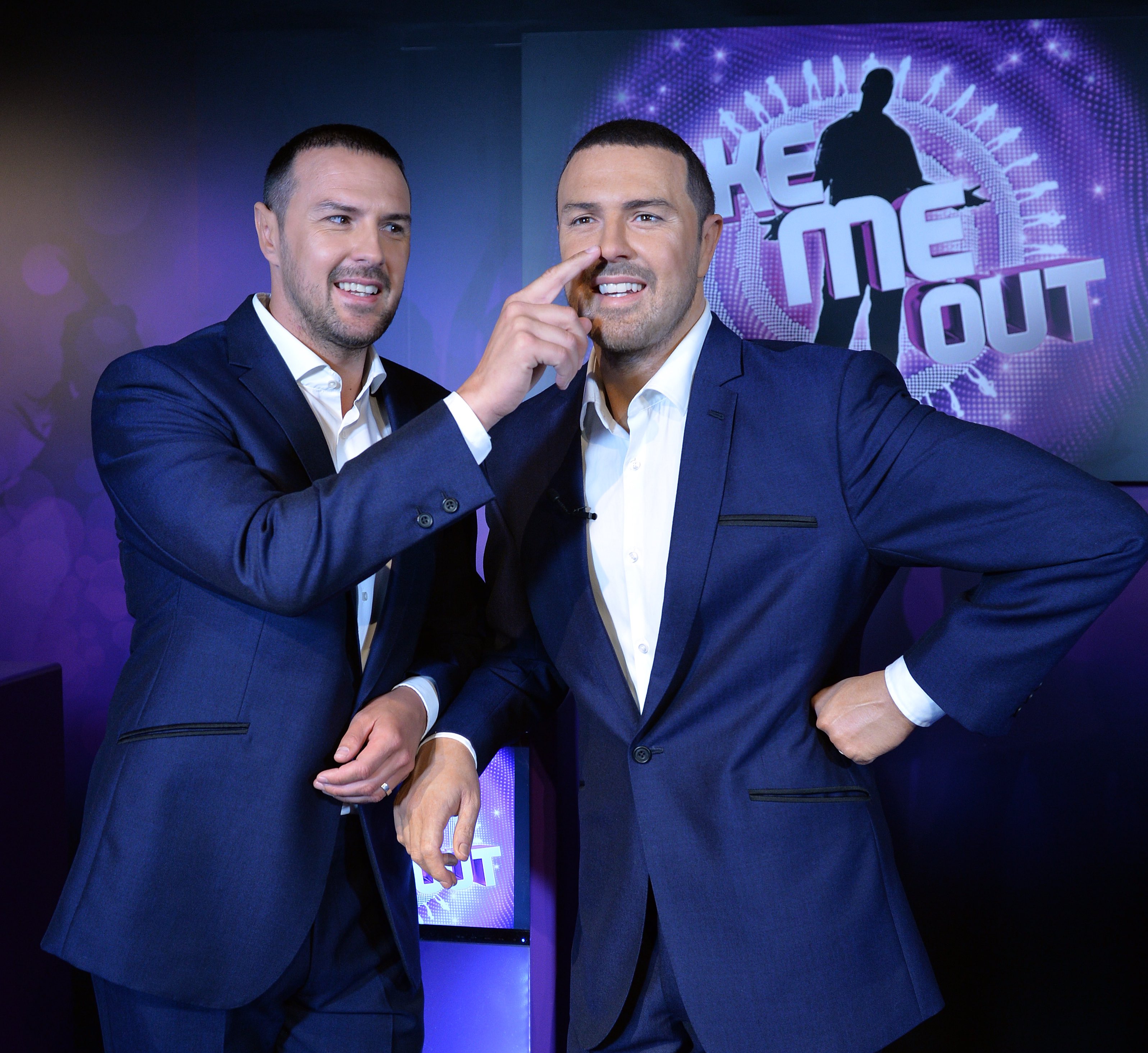 Paddy McGuinness touching his wax figure's nose at Madame Tussauds Blackpool