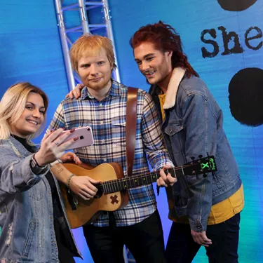 Guests taking a selfie with Ed Sheeran's wax figure at Madame Tussauds Blackpool