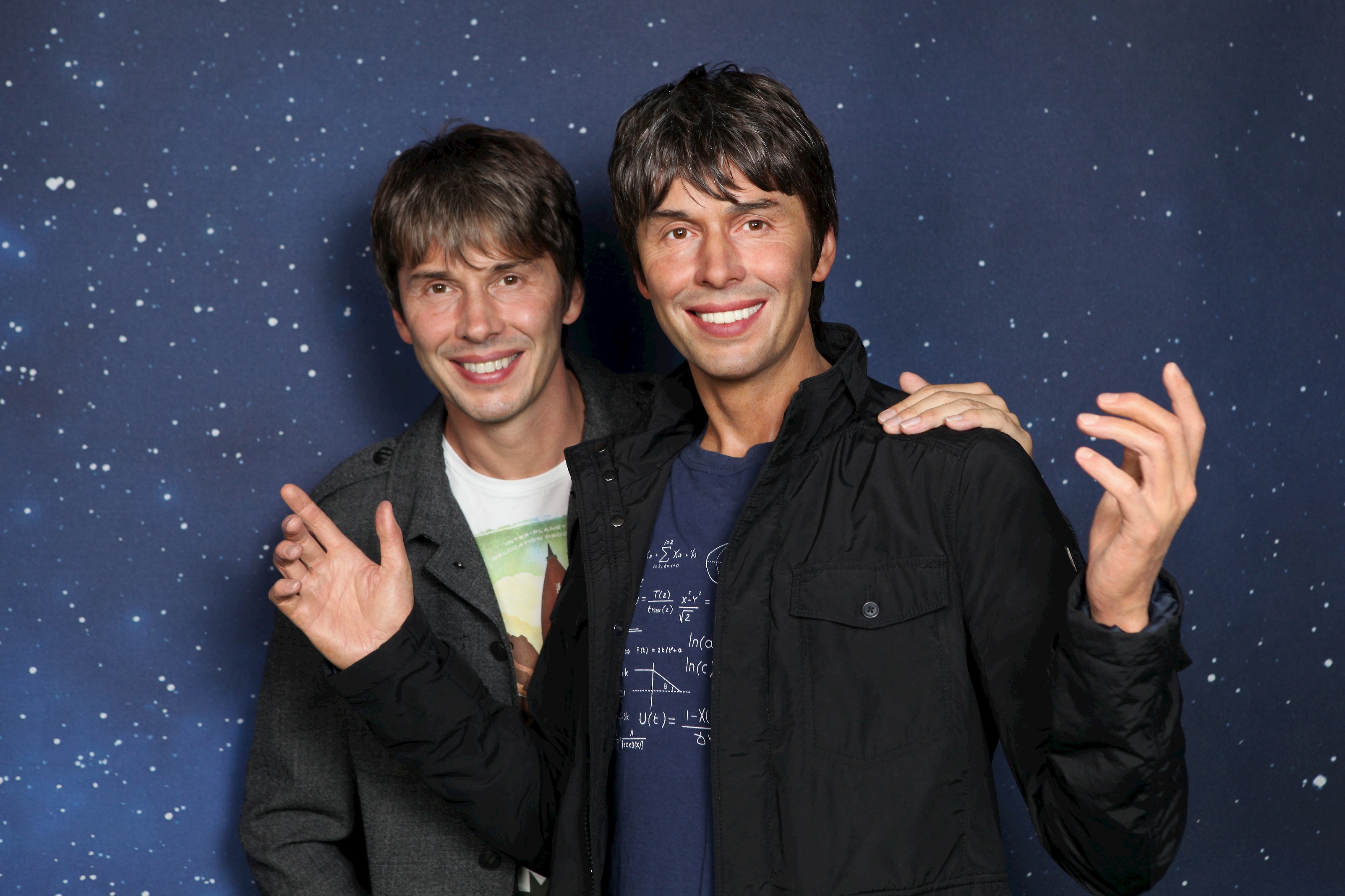 Brian Cox with his arm around his wax figure at Madame Tussauds Blackpool