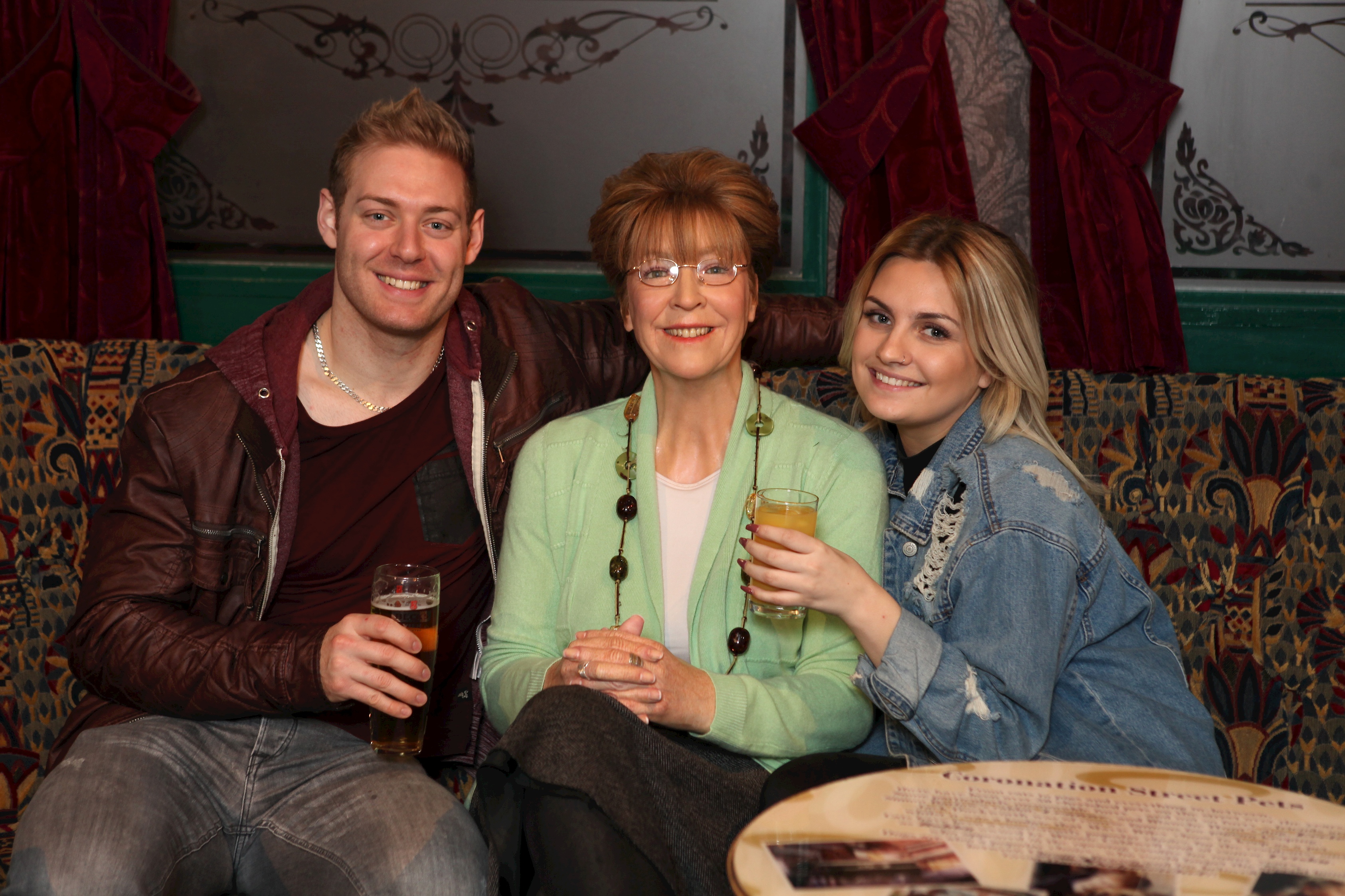 Guests take their photo with Deidre Barlow's wax figure in Rovers Return at Madame Tussauds Blackpool