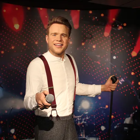 Olly Murs holding a mic wax figure at Madame Tussuads Blackpool
