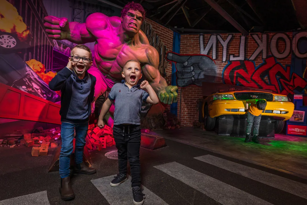 Children with the Hulk wax figure at Madame Tussauds Blackpool, UK