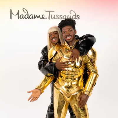 Lil Nas X poses with his wax figure