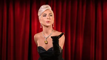 Realistic Lady Gaga wax figure at Madame Tussauds Hollywood, posed blowing a kiss