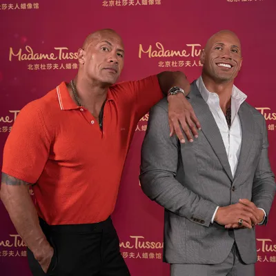 Dwayne Johnson with his figure