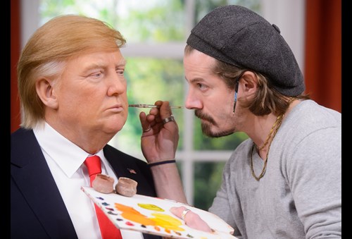 Artist Touching Up Donald Trump