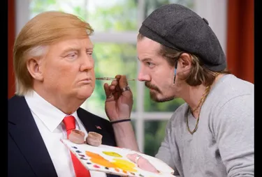 Artist Touching Up Donald Trump