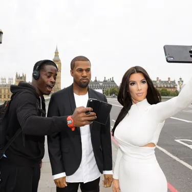 Kim Kardashian & Kayne West in front of Houses of Parliament