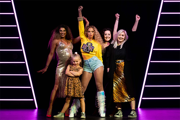 Fans with Beyonce's figure at Madame Tussauds London