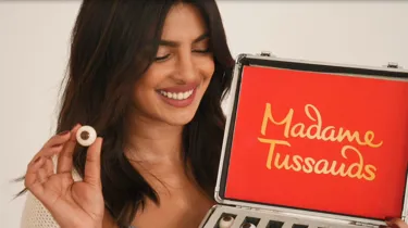 Priyanka Chopra Jonas at Madame Tussauds Studio matching her eye colour