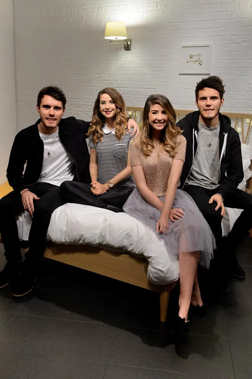 Zoella & Alfie with their figures