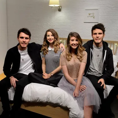 Zoella & Alfie with their figures