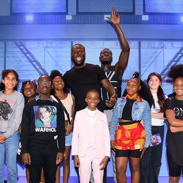 Stormzy with his own figures and children