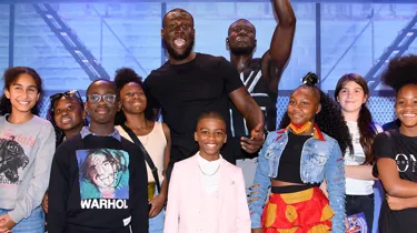 Stormzy with his own figures and children
