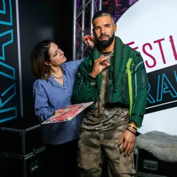 Drake's figure at Madame Tussauds London with Studio artist