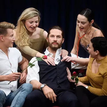 Fans interacting with Tom Hardy at Madame Tussauds