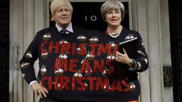 Boris Johnson Theresa May's figures in Christmas Jumper