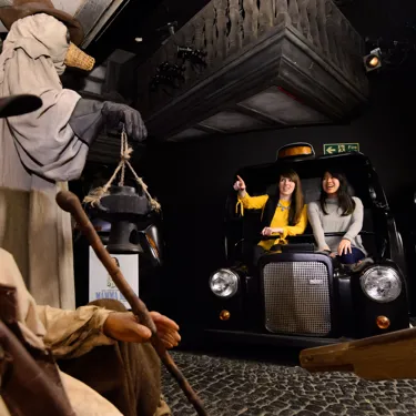 Friends riding the Spirit of London ride at Madame Tussauds London