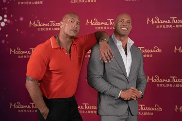 Dwayne Johnson with his figure at Madame Tussauds