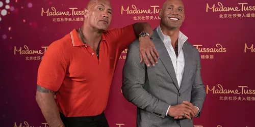 Dwayne Johnson with his figure at Madame Tussauds