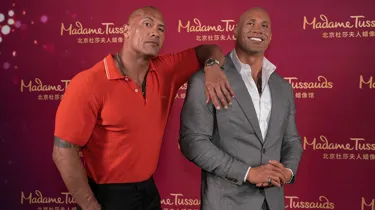 Dwayne Johnson with his figure at Madame Tussauds