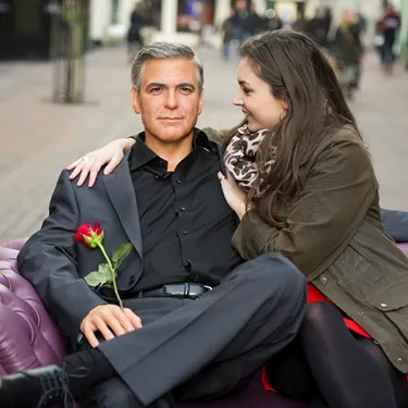 George Clooney with a fan at Carnaby Street