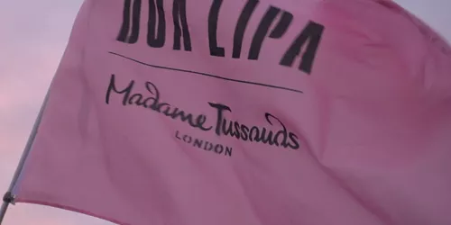 Dua Lipa and Madame Tussauds' flag