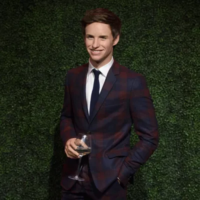 Eddie Redmayne figure holding a glass of wine at Madame Tussauds