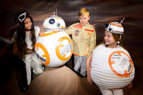 Kids dressed in BB-8 costume