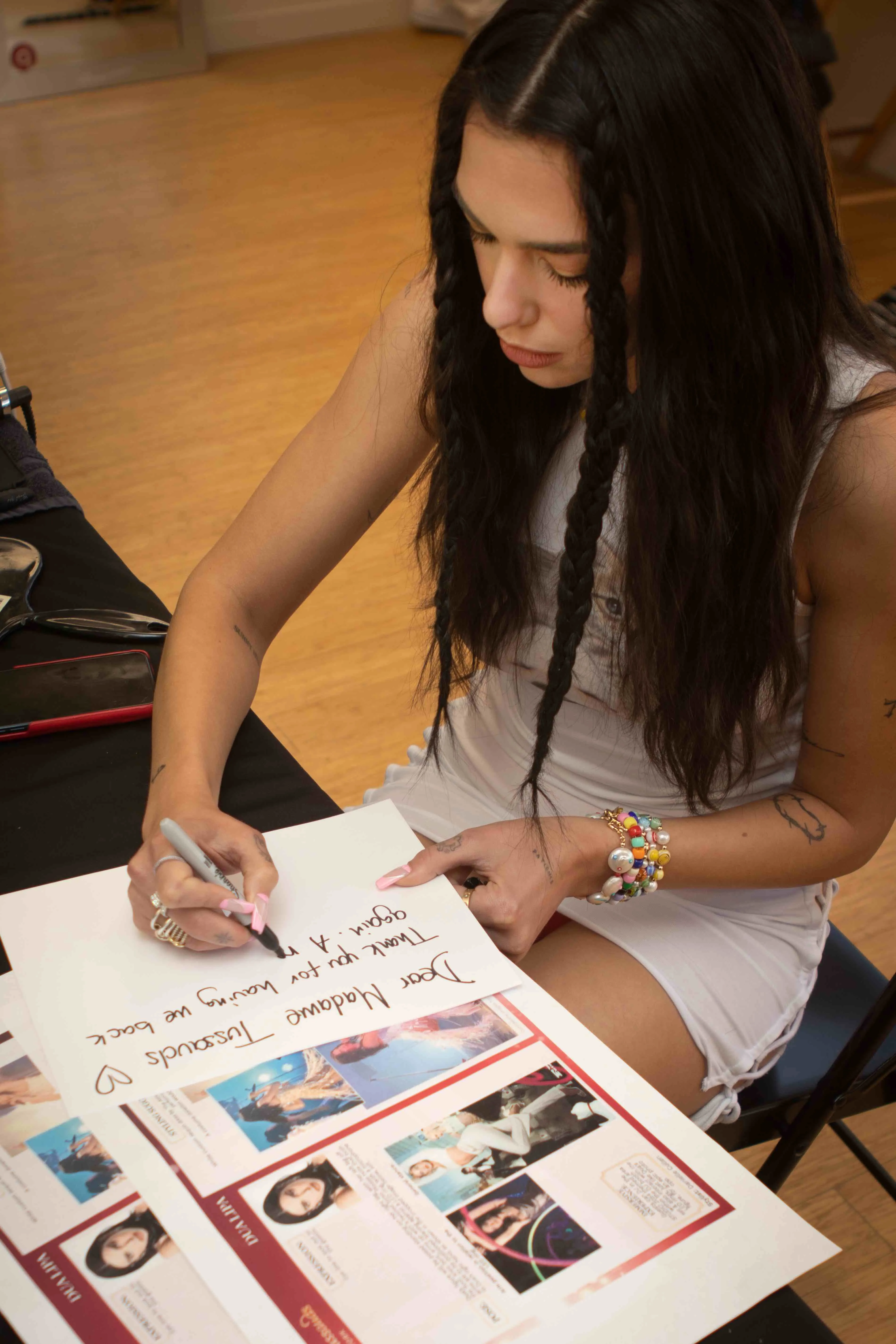 Dua Lipa Sitting Signing