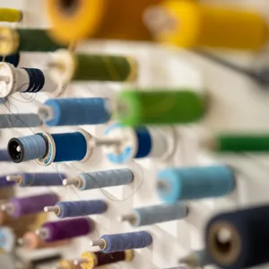 Image showing a large number of spools of sewing threads