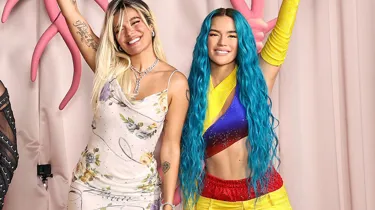 karol g in white and wax karol g in Columbia flag colored outfit