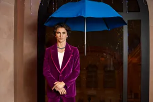 Timothee chalamet under an umbrella