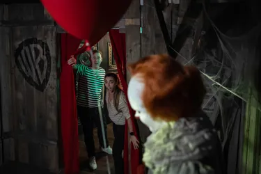 Guests being spooked by a horror icon wax figure