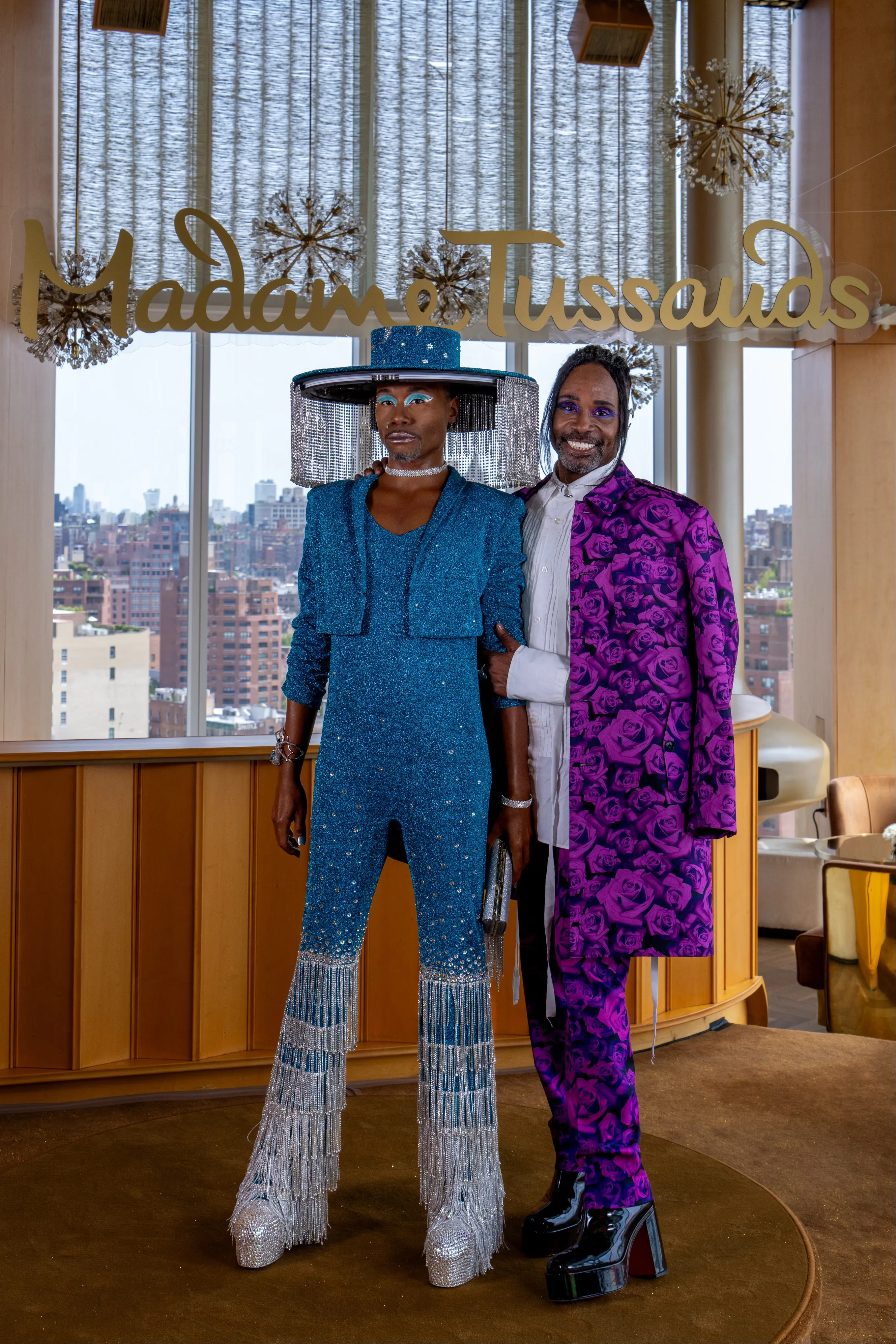 billy porter standing next to his wax figure