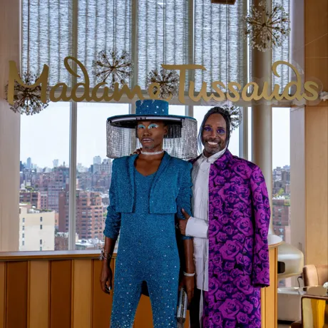 billy porter standing next to his wax figure