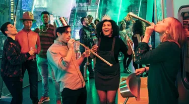 Group of friends celebrating while taking pictures at the World Famous Wax Museum Madame Tussauds New York